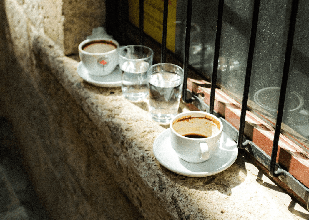 Why Do Coffee Shops Serve Coffee with a Glass of Water? TAYKURY COFFEE